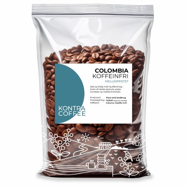 Kvinde forarbejder kaffeboenner i Tolima
